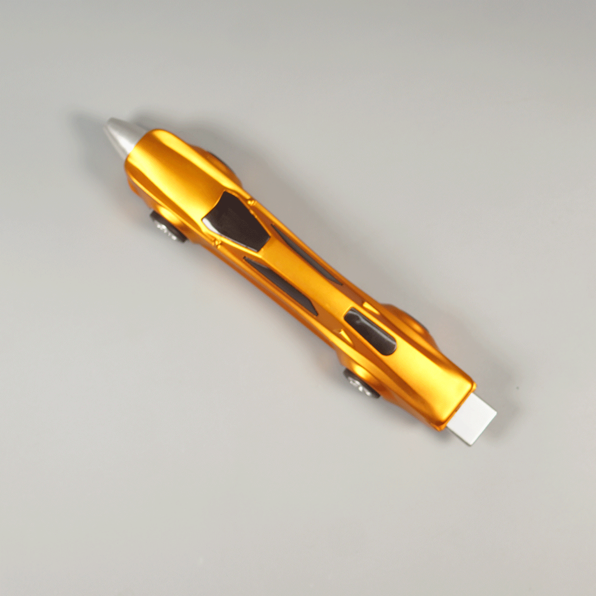 penhouse.in pens Yellow And Silver Color Body Racing Car Shaped Shiny Plastic And Working Wheels Fine Tip Ball Pen SKU 10314