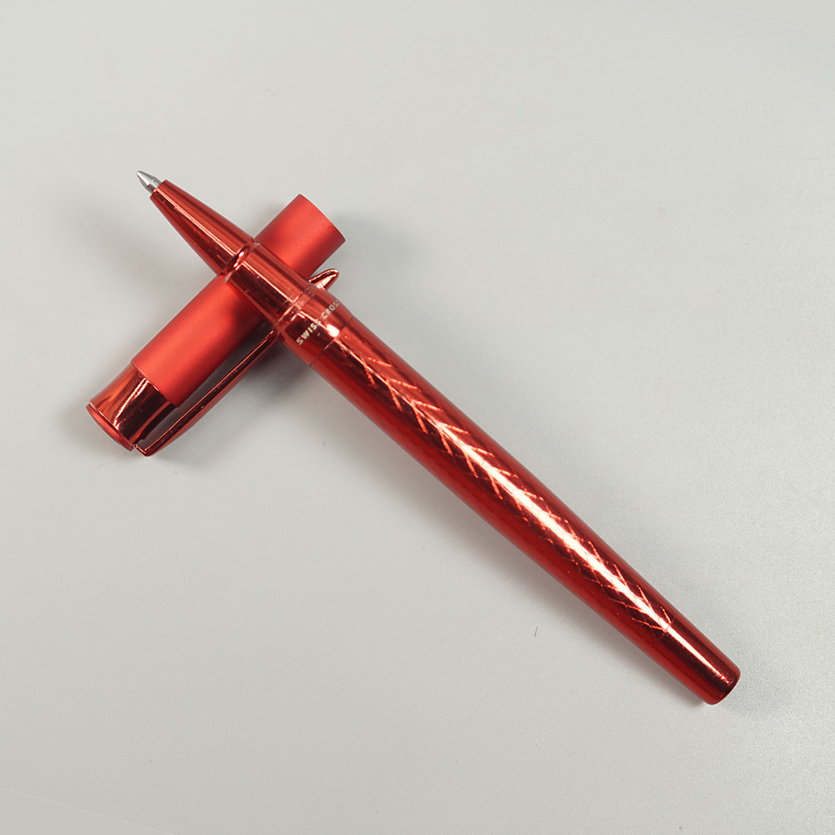 Swiss Cross 1001 Red Color Body With Clip And Trim Fine Tip Roller Ball Pen SKU 10573