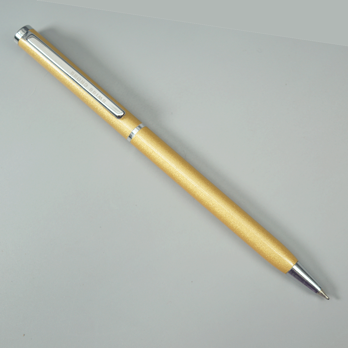 Swiss Cross Golssy Gold  Color Body With Silver Color Trim And Clip Fine Tip Twist Type Ball Pen SKU 10870