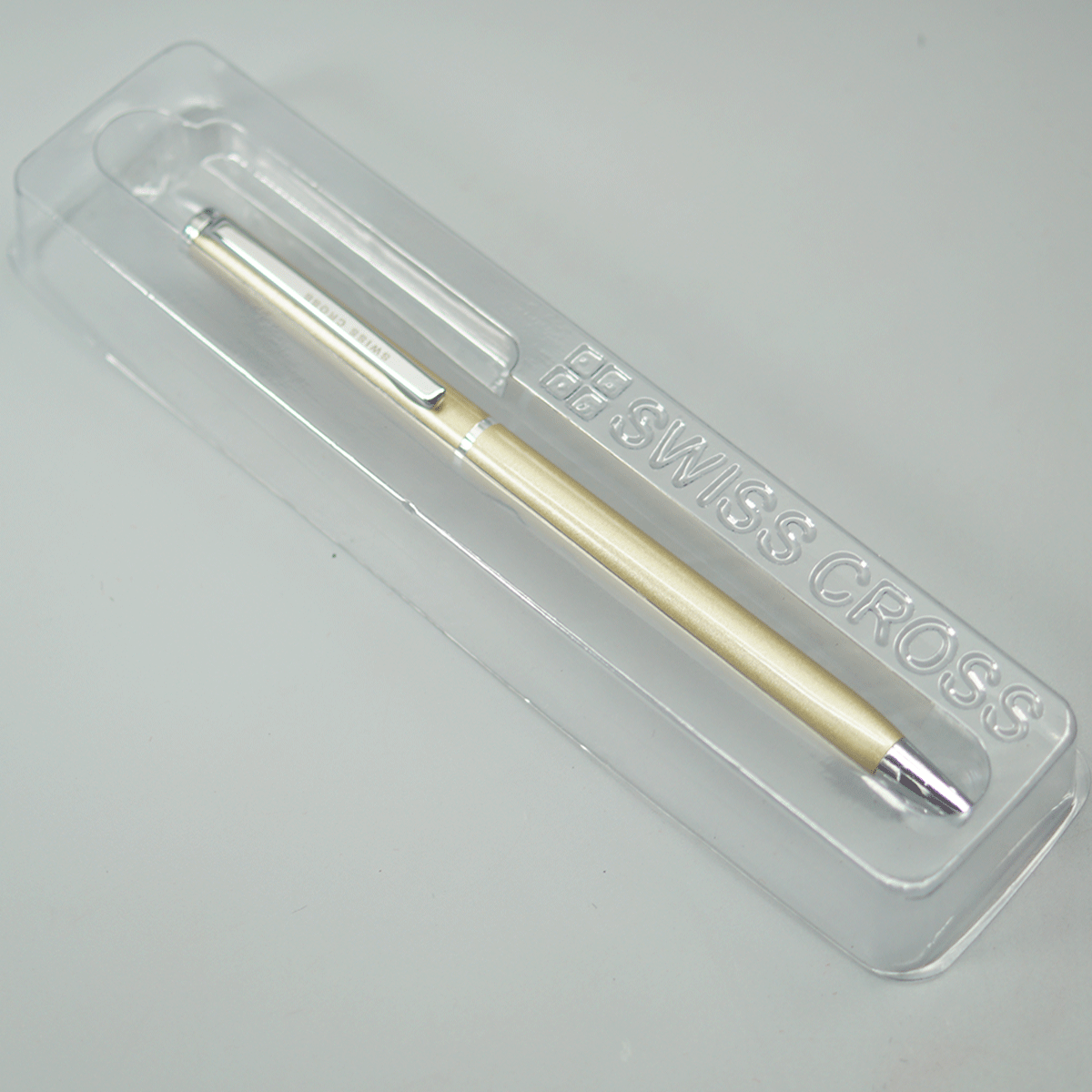 Swiss Cross Glossy Light Silver Gold Color Body And Silver Color Trim And Clip Fine Tip Twist Type Ball Pen SKU 10872