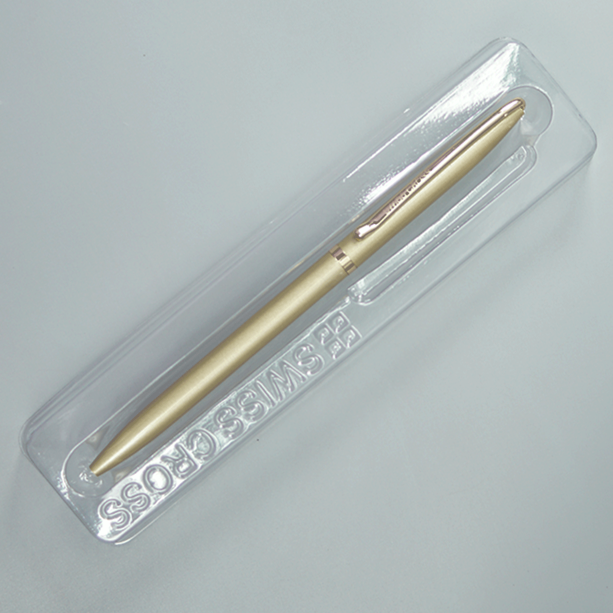 Swiss Cross 929 Glossy Silver Gold Color Body And Gold Color Trim And Clip Fine Tip Twist Type Ball Pen SKU 10944