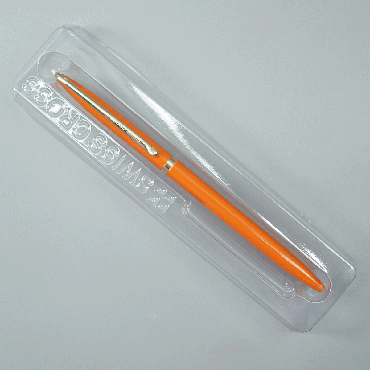 Swiss Cross Glossy Orange Color Body And Gold Color Trim And Clip Fine Tip Twist Type Ball Pen SKU 10957