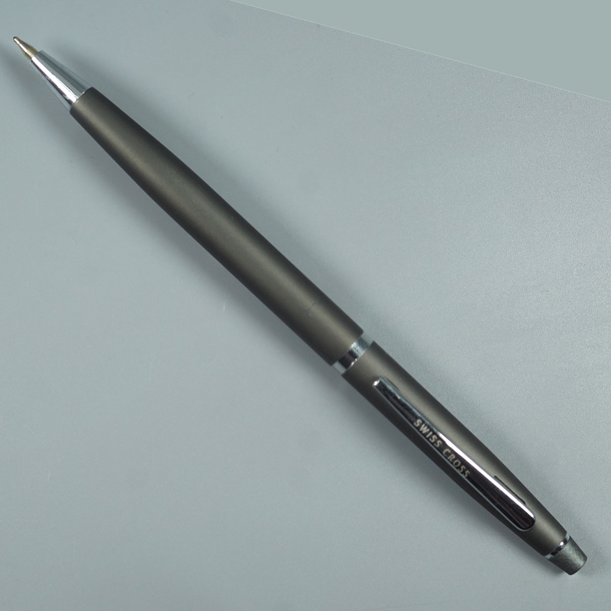 Swiss Cross 2067 Gray Color Body With Silver Color Clip Twist Type Ball Pen SKU 10993