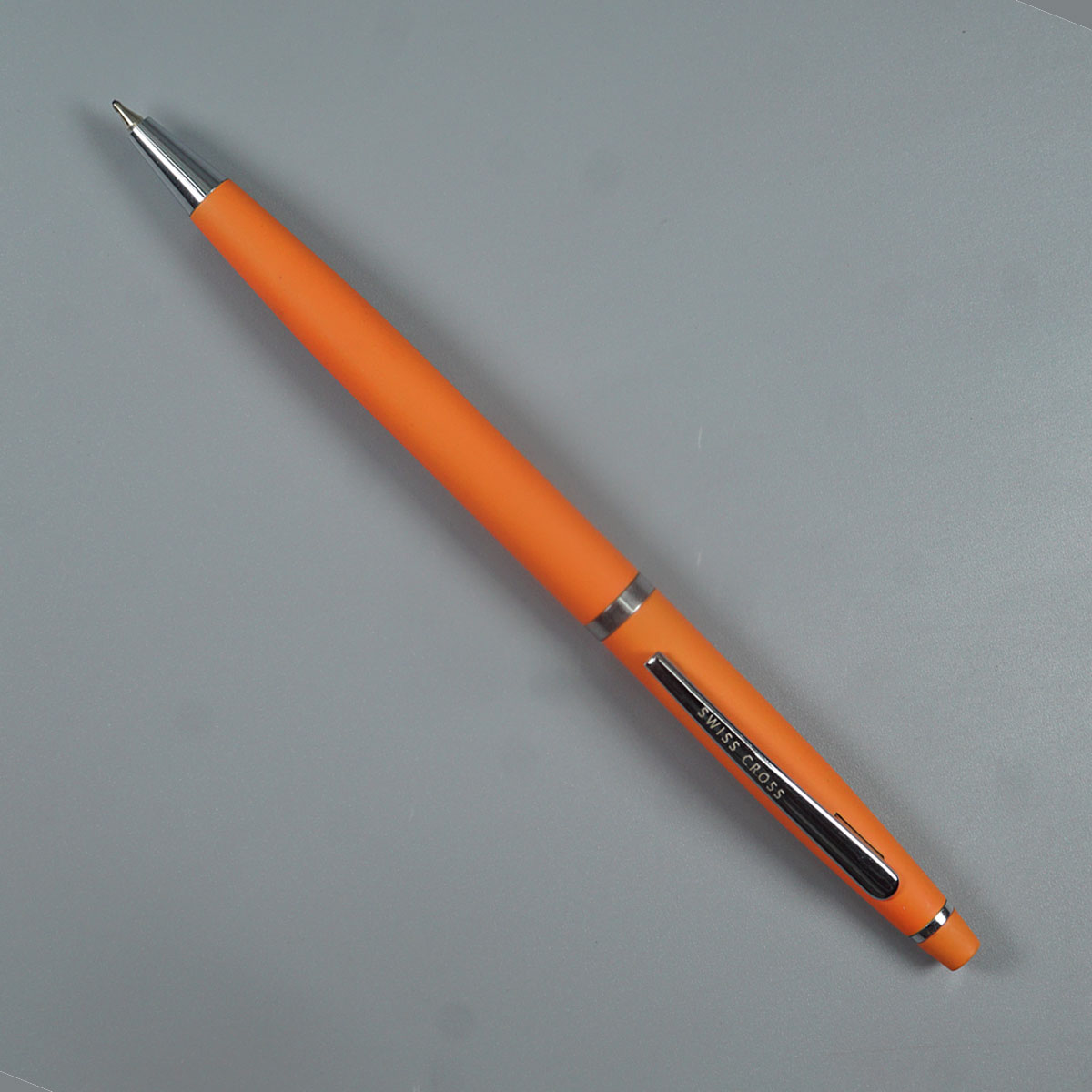 Swiss Cross 2067 Orange Color Body With Silver Color Clip Twist Type Ball Pen SKU 10996