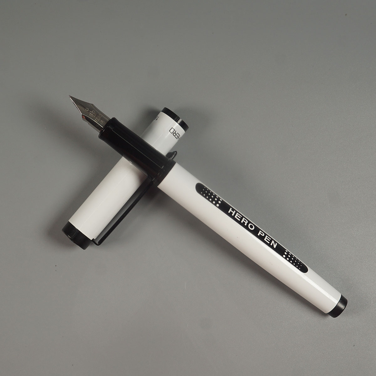 Hero 1603 White With Black Color Clip And Trim Fine Nib Converter Type Fountain Pen SKU 11573