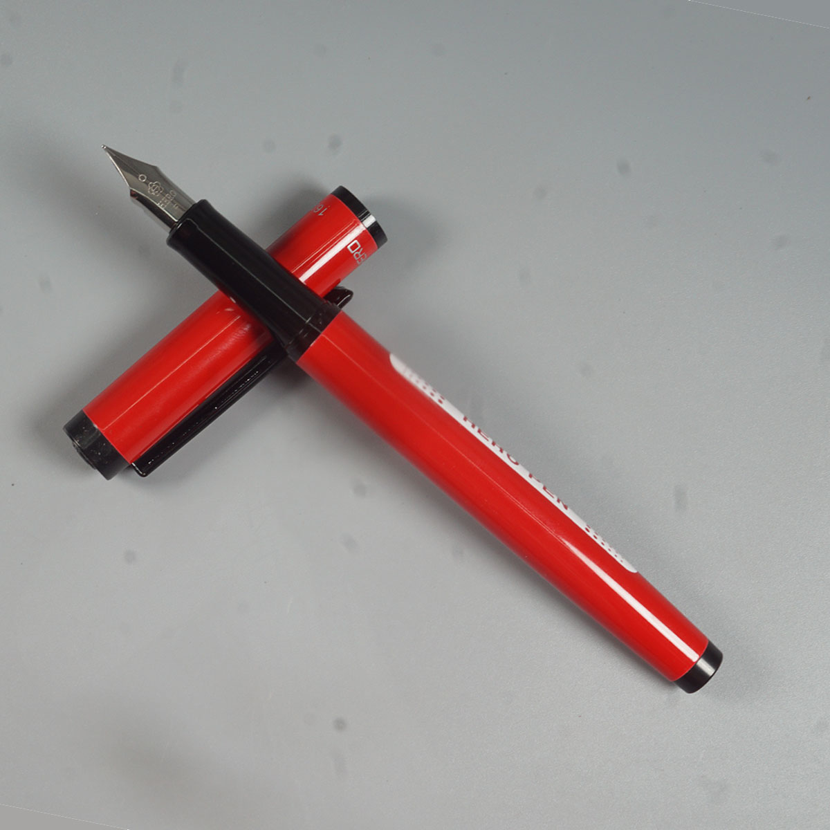Hero 1603 Red Color Body With Black Color Clip And Trim Fine Nib Converter Type Fountain Pen SKU 11579