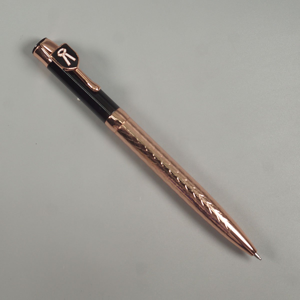 penhouse.in pens Rose Gold Color Body With Black Color Cap With Advocate Symbol Twist type Ball Pen SKU 14457