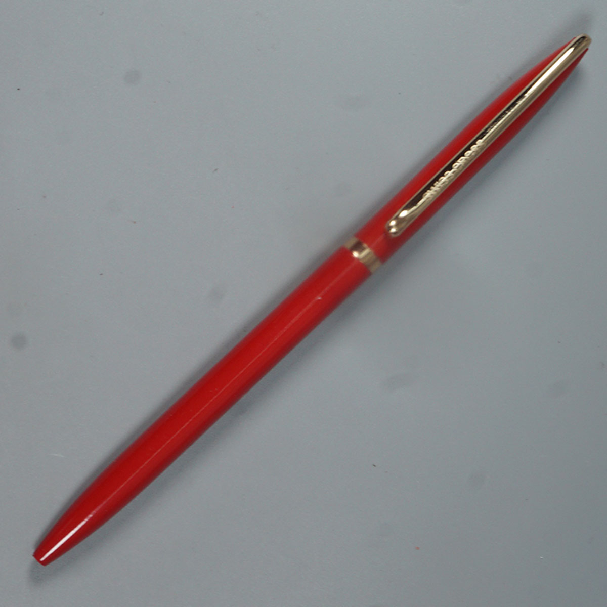 Swiss Cross 929 Glossy Red Color Body And Gold Color Trim And Clip Fine Tip Twist Type Ball Pen SKU 14585