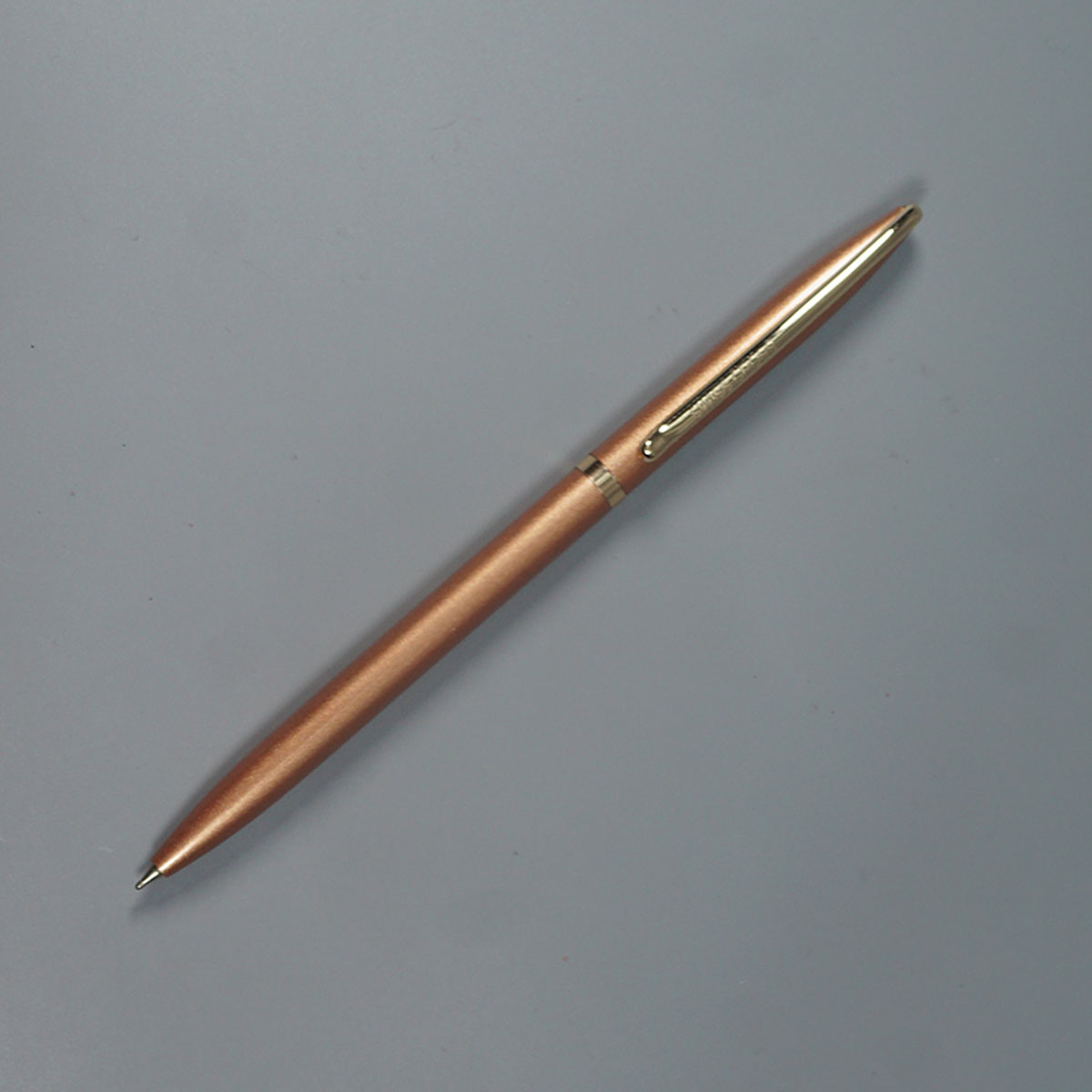 Swiss Cross 929 Glossy Copper Gold Color Body And Gold Color Trim And Clip Fine Tip Twist Type Ball Pen SKU 14589