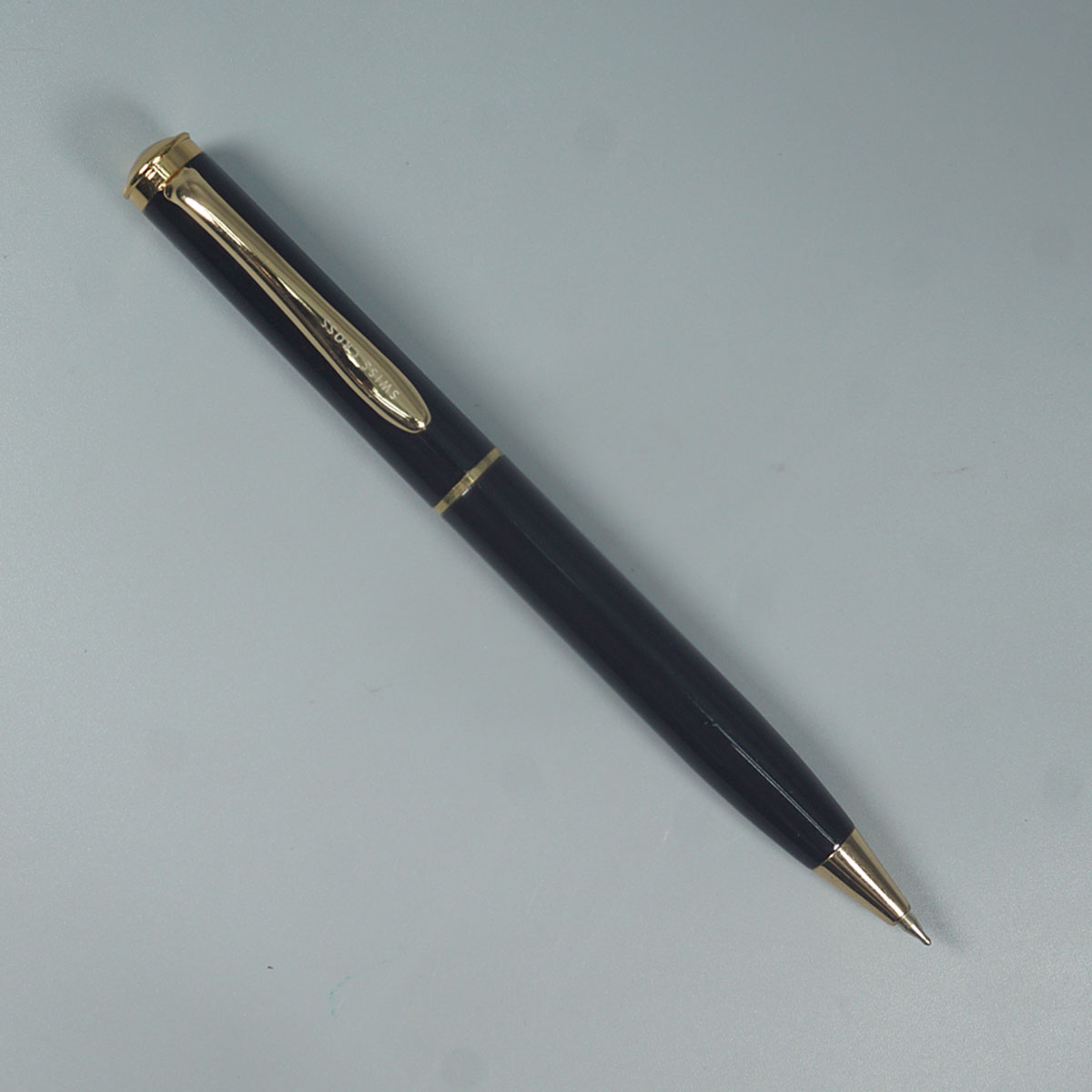 Swiss Cross 555 Black Color Body With Gold Color Clip Twist Type Ball Pen SKU 14638