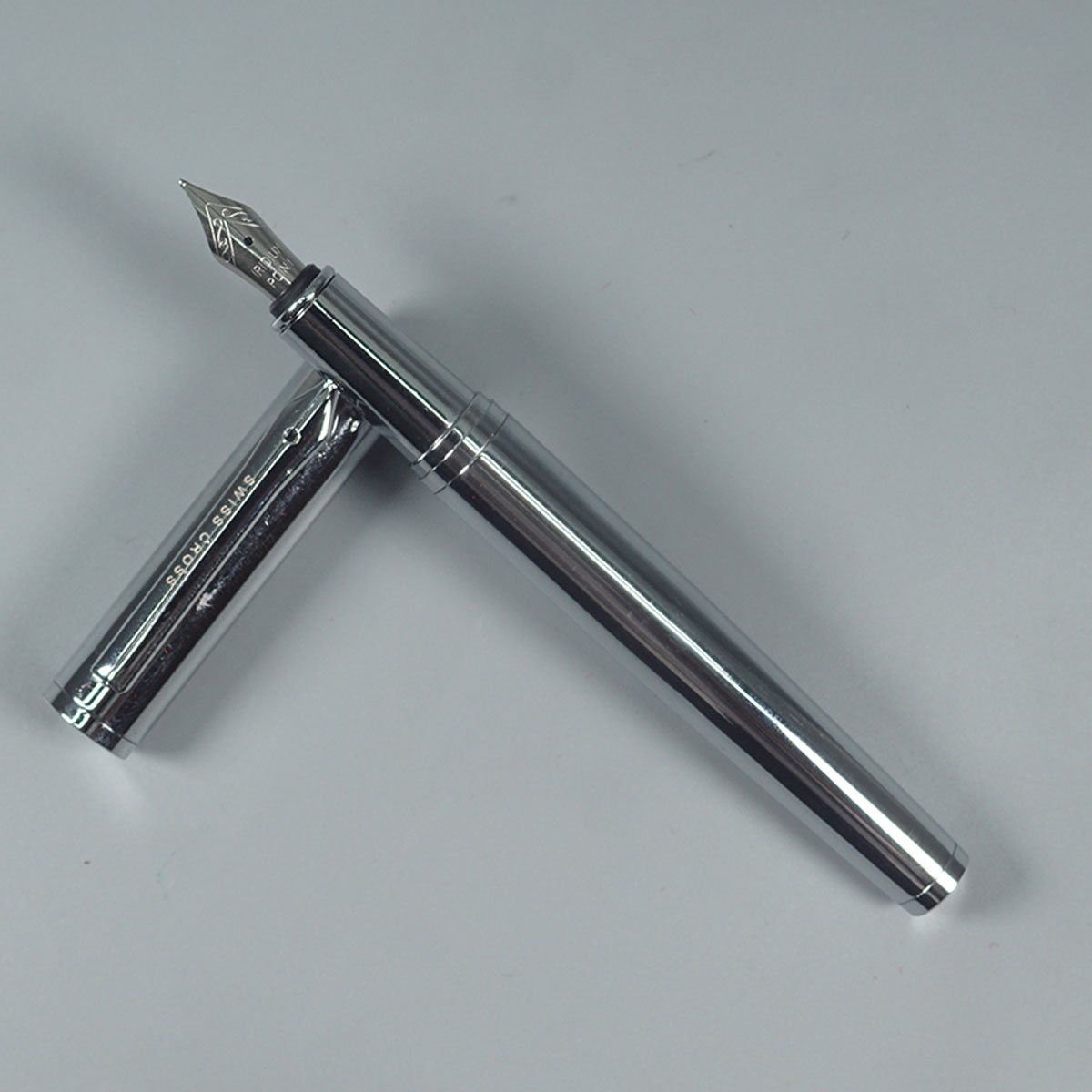 Swiss Cross 915 Full Silver Color Body With Magnetic Type Cap And Cartridge And Converter Type Fountain Pen SKU 14639