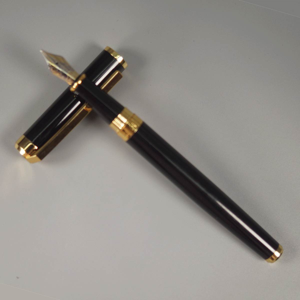 Hero 1607 Glossy Black Color Body, Black Cap with Gold Clip, Converter Type Fountain Pen  SKU 14646
