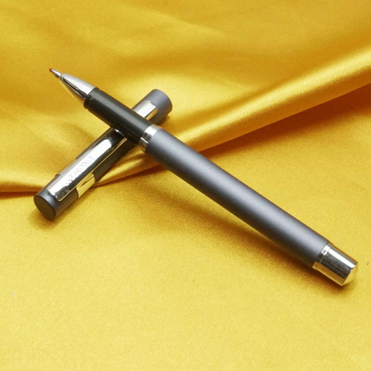 Unomax Nexa Roller Grey Color Body With Silver Trim Medium Tip  Cap Type Roller Ball Pen SKU 20352