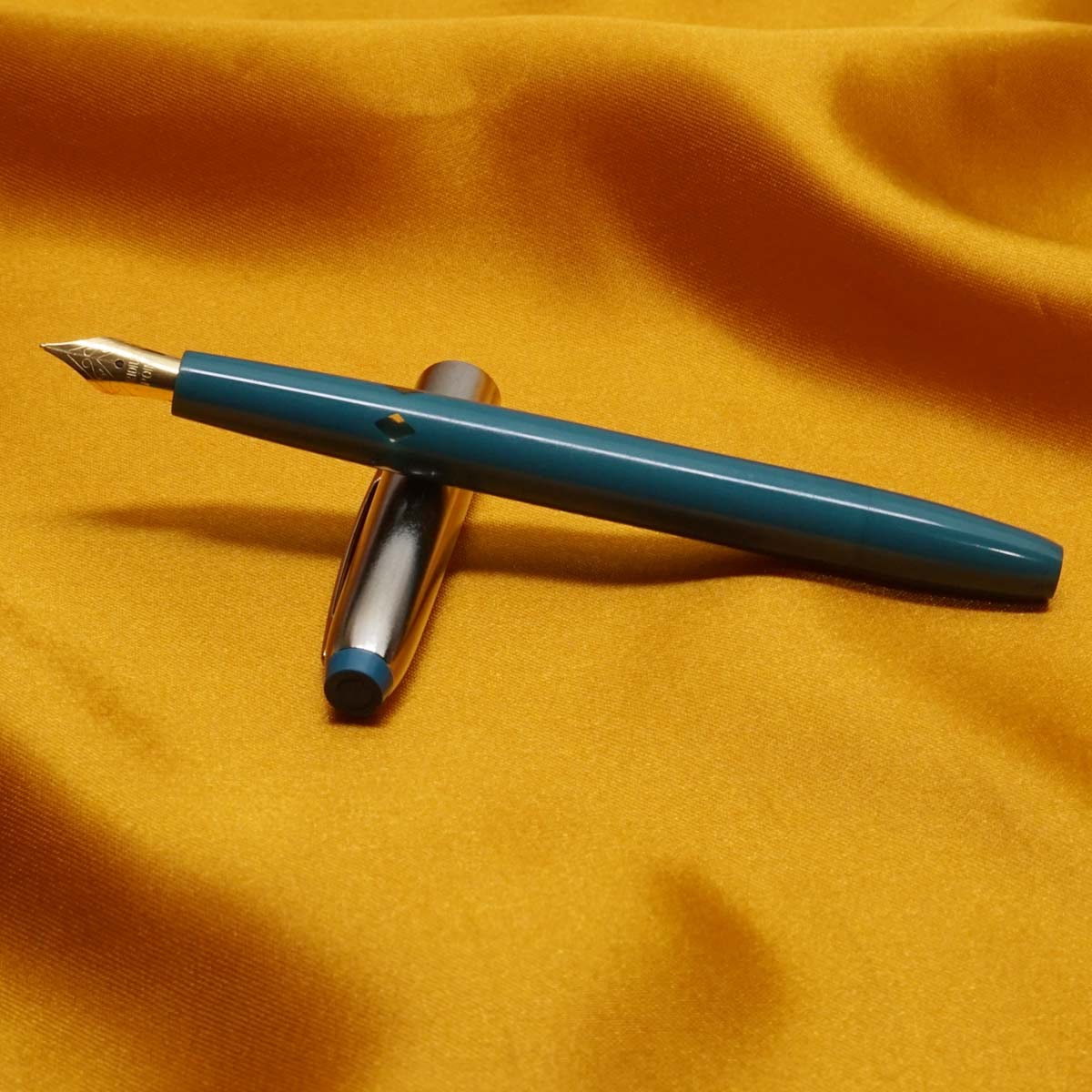 V Sign Beena Neo Turquoise Blue Color Body Silver Cap with Gold Trim No.5.5 GP Fine Tipped  Piston Type Filling Fountain Pen SKU 20646