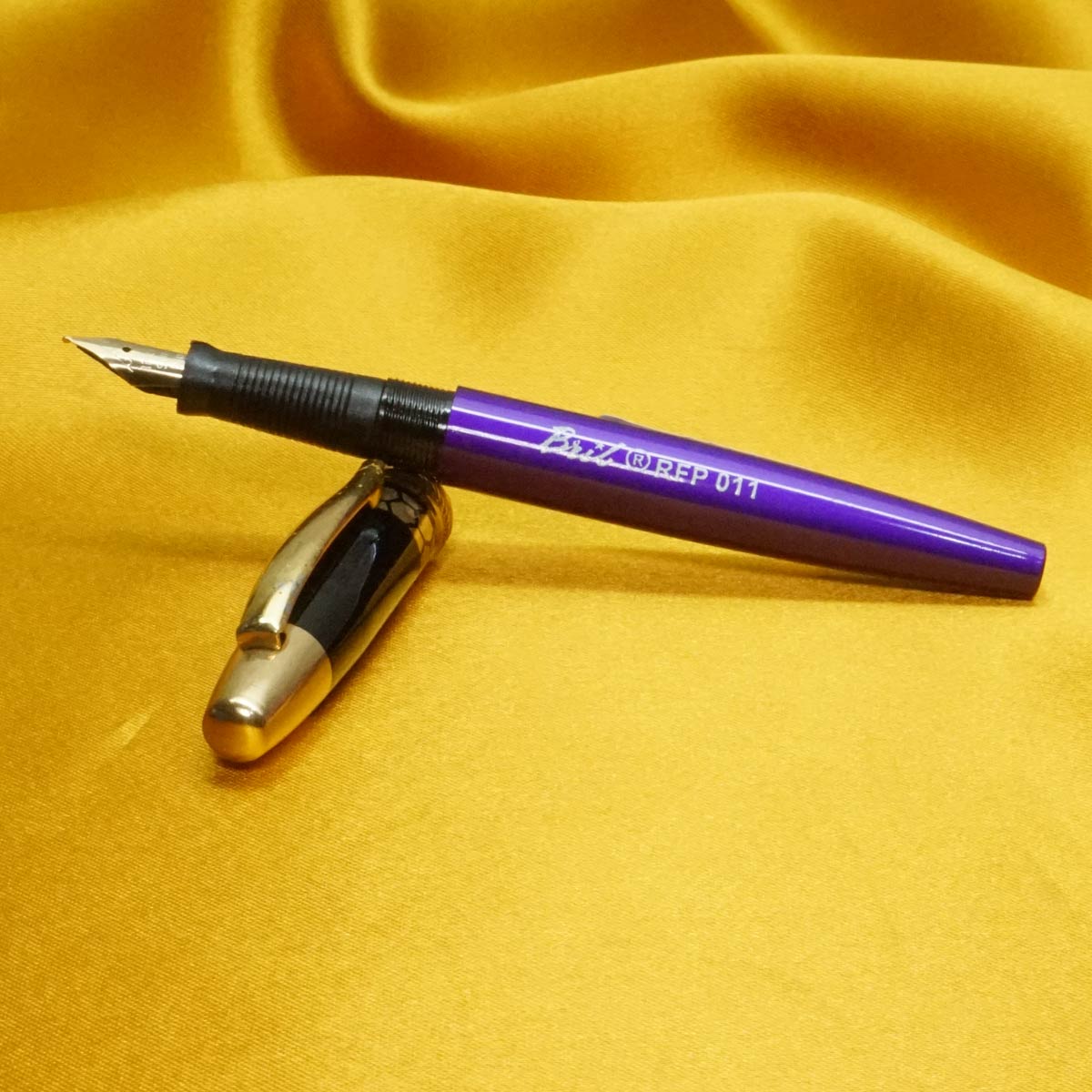 Bril 011 Violet Color Body Black Cap with No.5 GP Fine Tipped Eye Dropper Model Fountain Pen SKU 20911