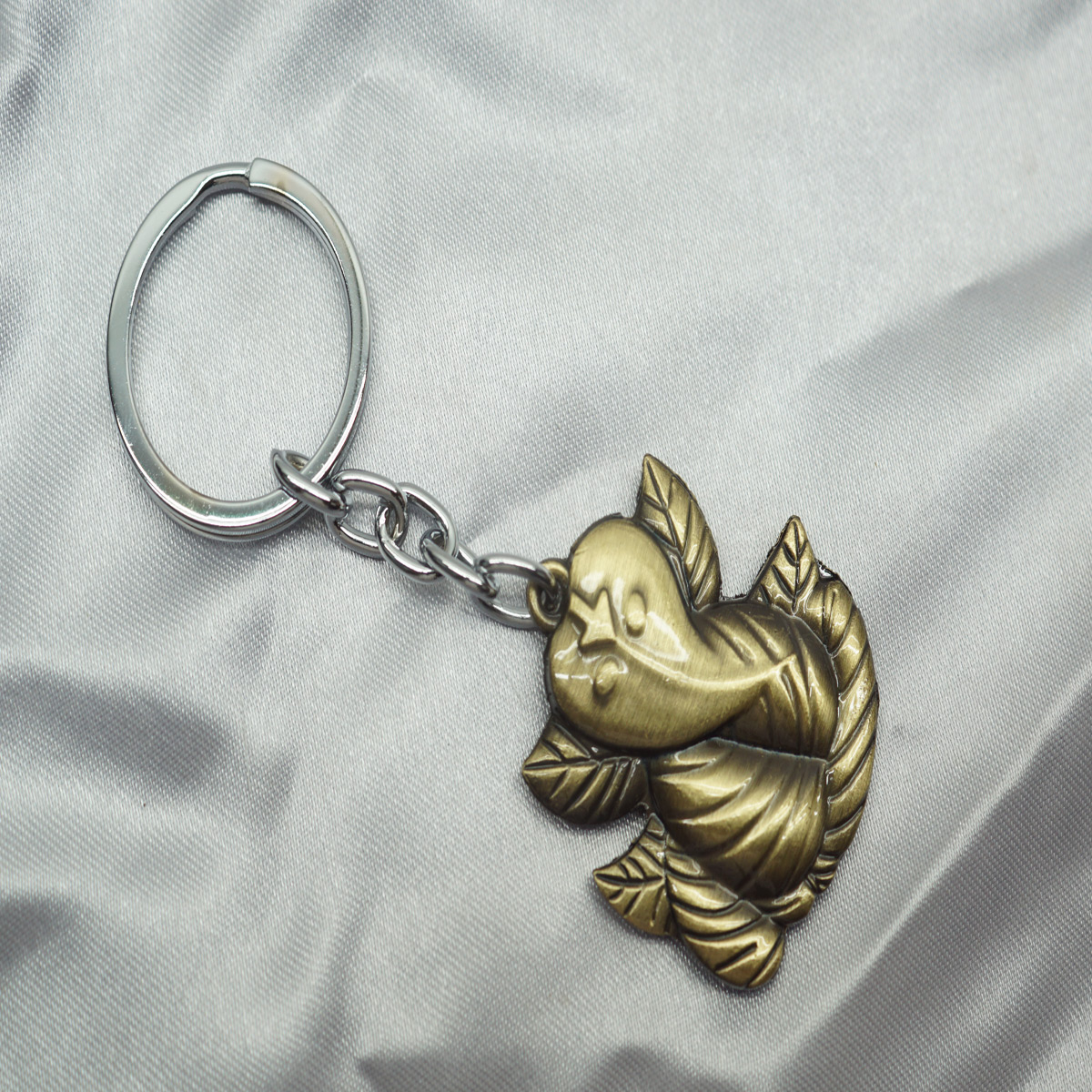 penhouse.in Leaf Ganesha Dull Gold Color Metal Keychain SKU KP281