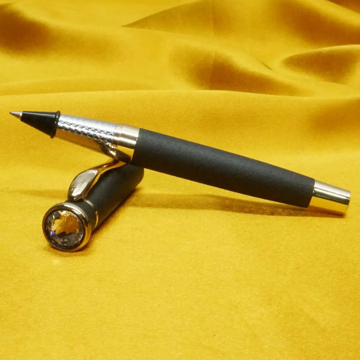 Submarine 1501 Mat Black Color Body With Medium Tip Gold Trim Big Stone On  Top Roller Ball Pen SKU 21358