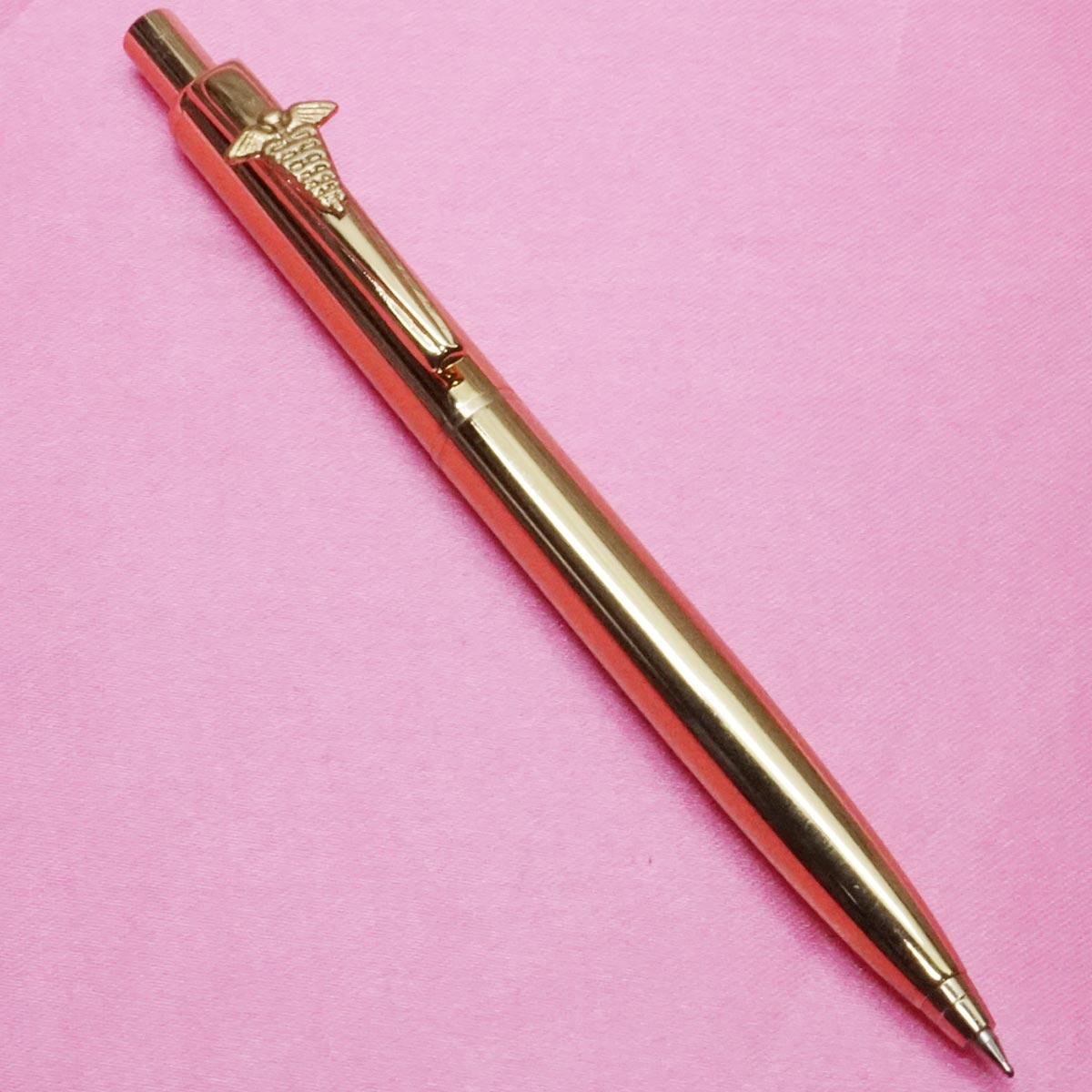 penhouse.in Gold Glossy Finish  Body With Fine Tip Doctor Symbol Clip Click Type Ball Pen SKU 21650