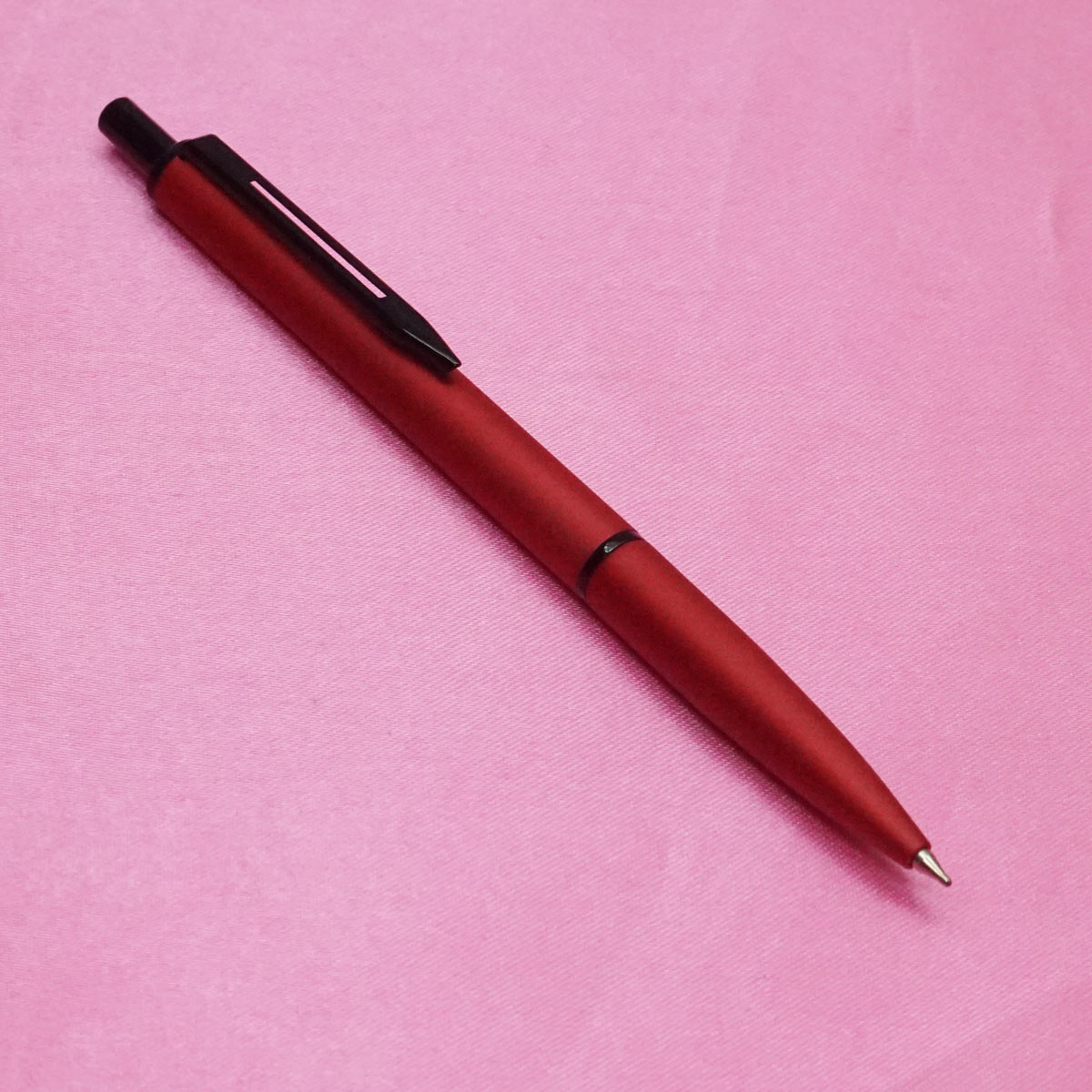 Penhouse.in  Slim Red Color Body Mat Finish with Black Clip Fine Tip Rectractable Ball pen SKU 21749