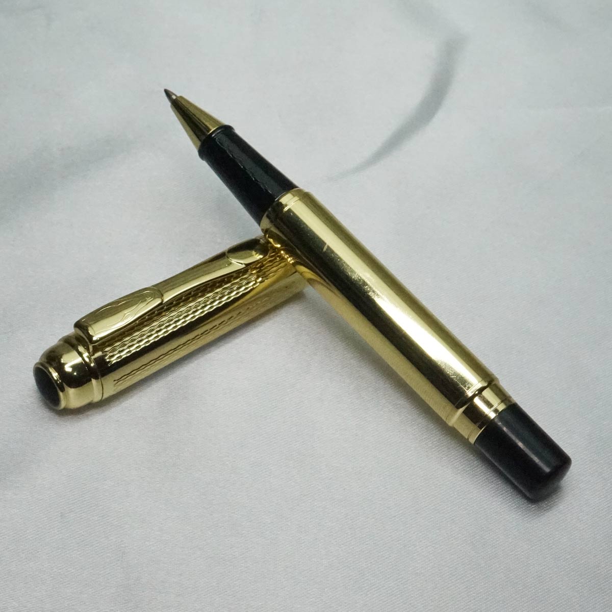 penhouse.in Gold Body and Cap with Black Body Bottom Roller Ball SKU 21835