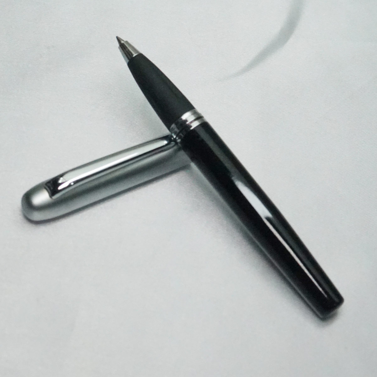 penhouse.in Black Body Silver Clip Magnetic Cap Roller Ball Pen SKU 21841