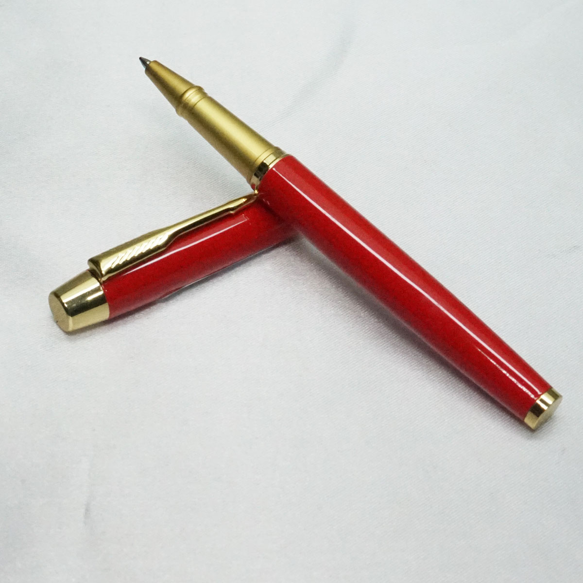 penhouse.in Red Color Roller Ball Pen with Gold Trims SKU 21847