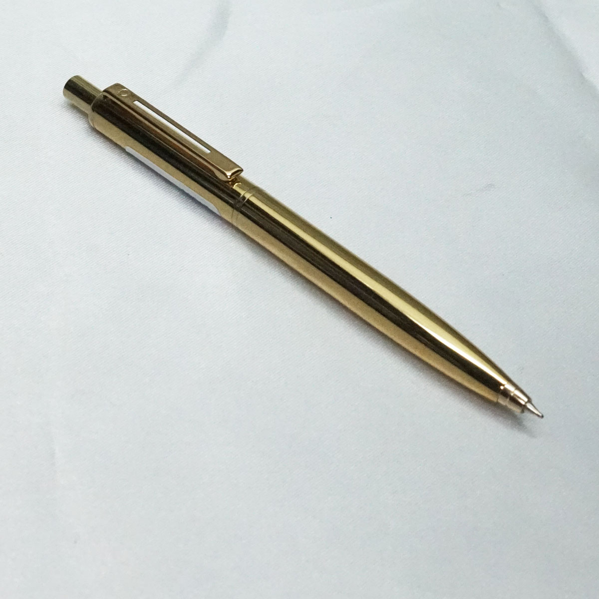 penhouse.in Glossy Gold Body and Cap fine Tipped Retractable Ball Pen SKU 21880