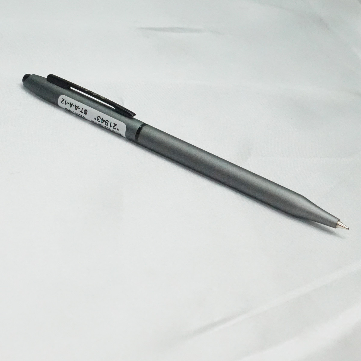 Realto Axon Slim Grey Color Body With Black Clip Fine Tip Twist Type Ball Pen  SKU 21943