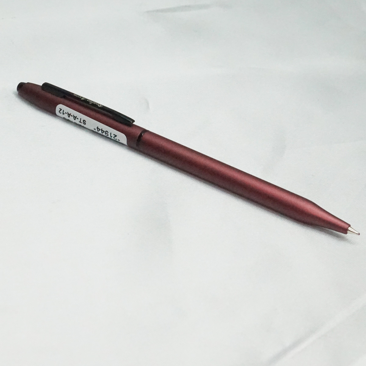 Realto Axon Slim Prick Color Body With Black Clip Fine Tip Twist Type Ball Pen  SKU 21944