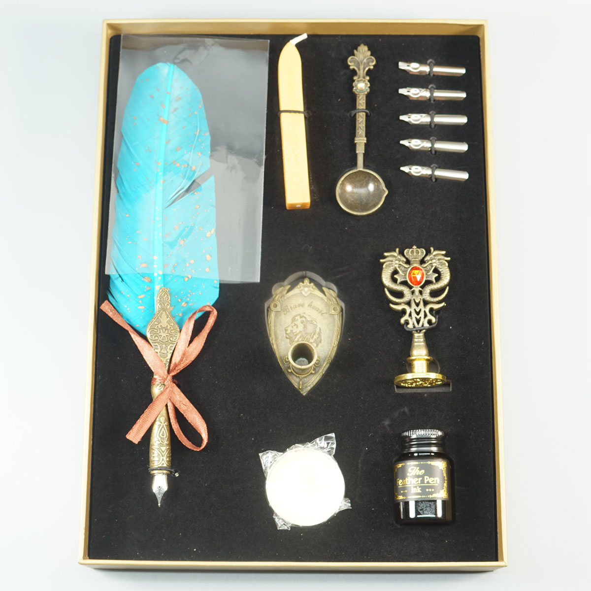 penhouse.in Feather Pen Set  Turquoise Green Color Feather with Stand and Inkbottle with 6 Nibs SKU 22096