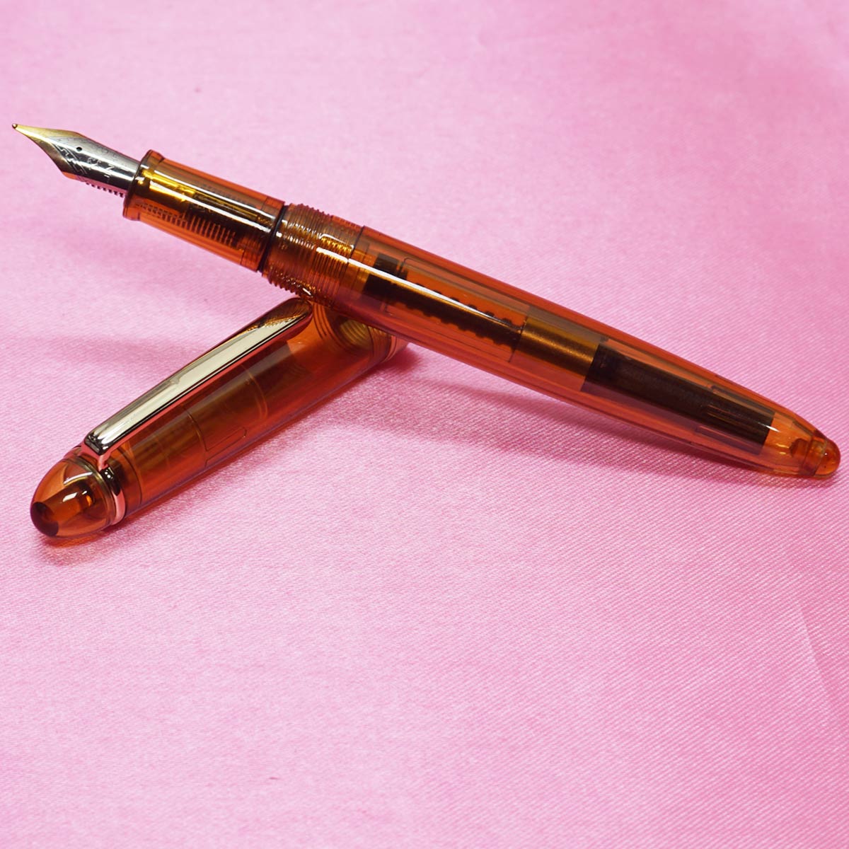 Jihao 992 Brown Transparent  Color Body and Cap with Gold Trims Converter Type cum Eyedropper Model No.5.5 Dual Tone Fine Tipped Nib Fountain pen SKU 22321