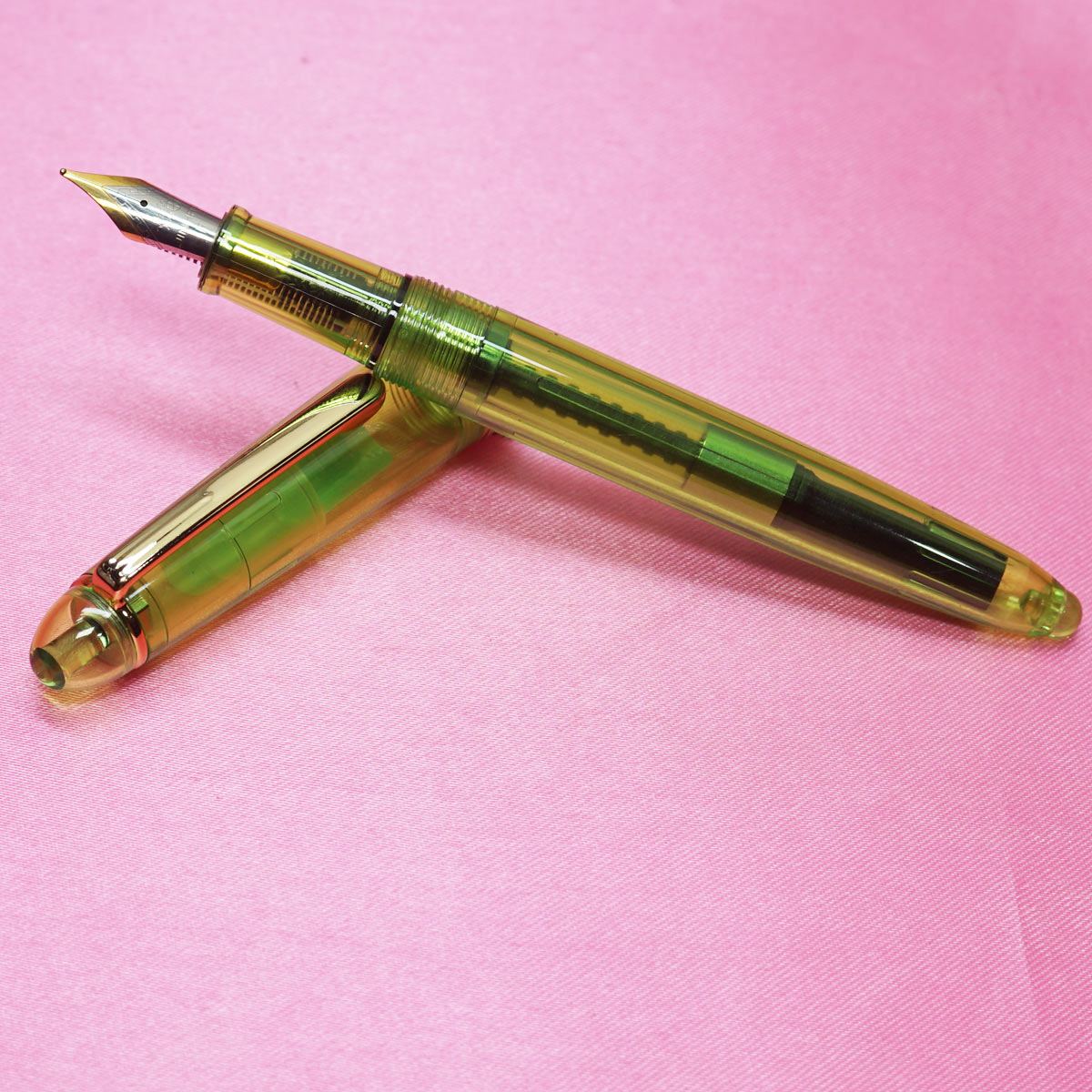 Jihao 992 Green Transparent  Color Body and Cap with Gold Trims Converter Type cum Eyedropper Model No.5.5 Dual Tone Fine Tipped Nib Fountain pen SKU 22322