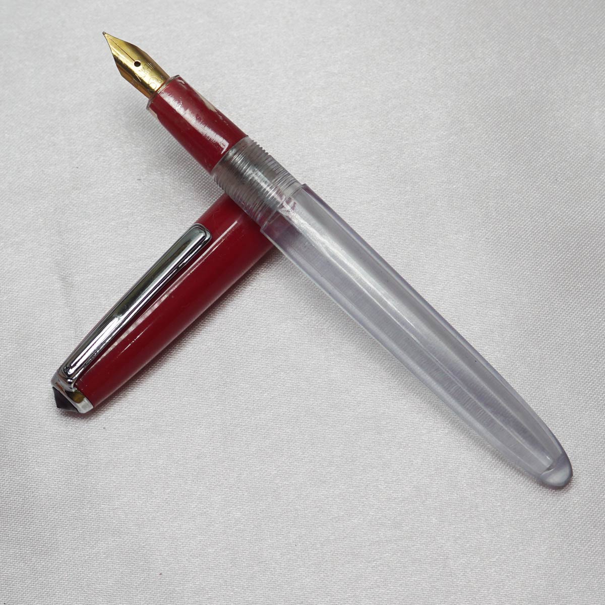 penhouse.in Transparent Body With Red Color Cap Silver Clip Fine Nib