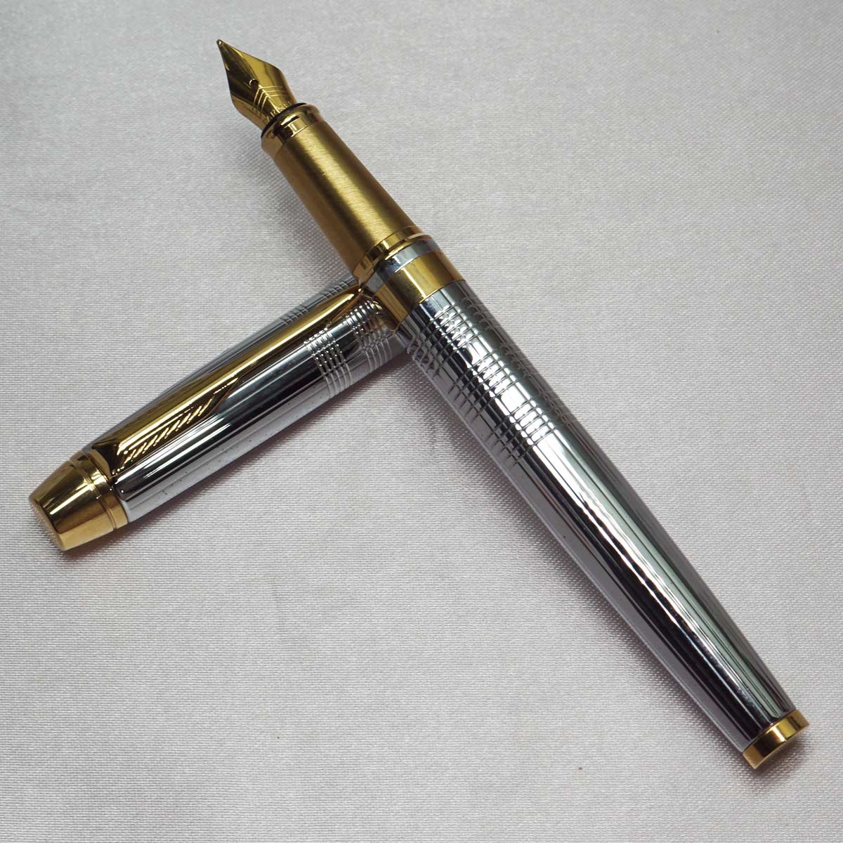 Parker Shiny Chrome Chiselled Body Design With Gold Trim Medium Nib