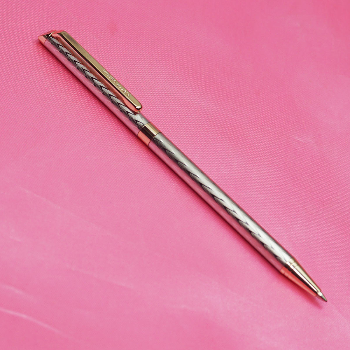 Pierre Cardin Decent Silver Color Body With Gold Clip and Golden Trims Medium Tip Twist Type Ball Pen SKU 22596