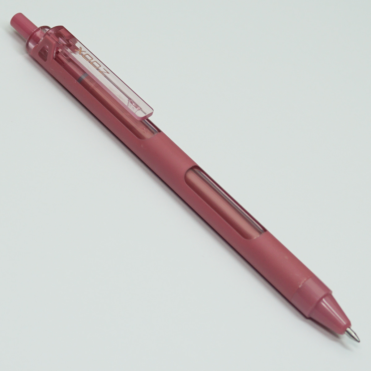Flair Zoox Plum Color Body With Medium Tip Blue Writing Click Type Roller Ball Pen SKU 22660