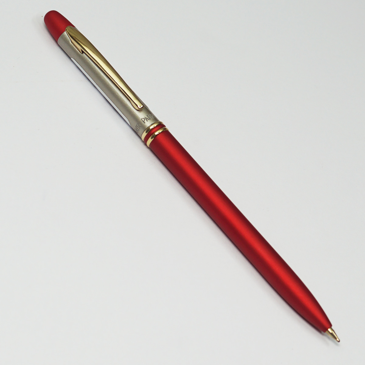 Picasso Parri Neo Red Color Body With Gold Clip Fine Tip Twist Type Ball Pen SKU 22829