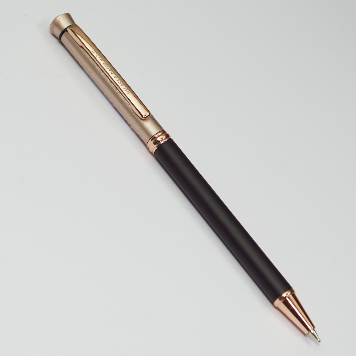 Picasso Pari Wish Black Color Body with Rose Gold Cap Fine Tip Twist Type Ball Pen SKU 22855