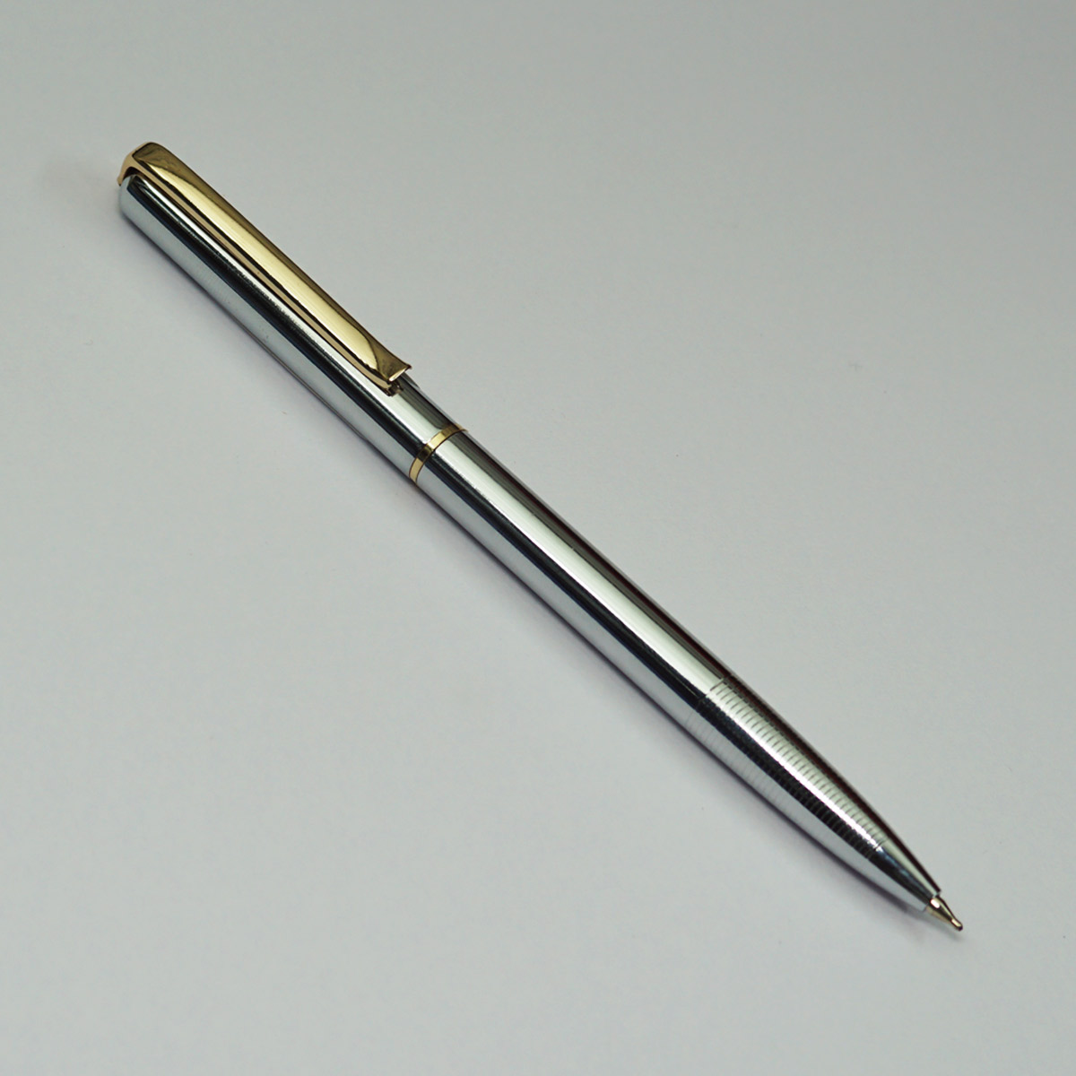penhouse.in Silver Color Body With Gold Clip Fine Tip Twist Type Ball Pen SKU 22940