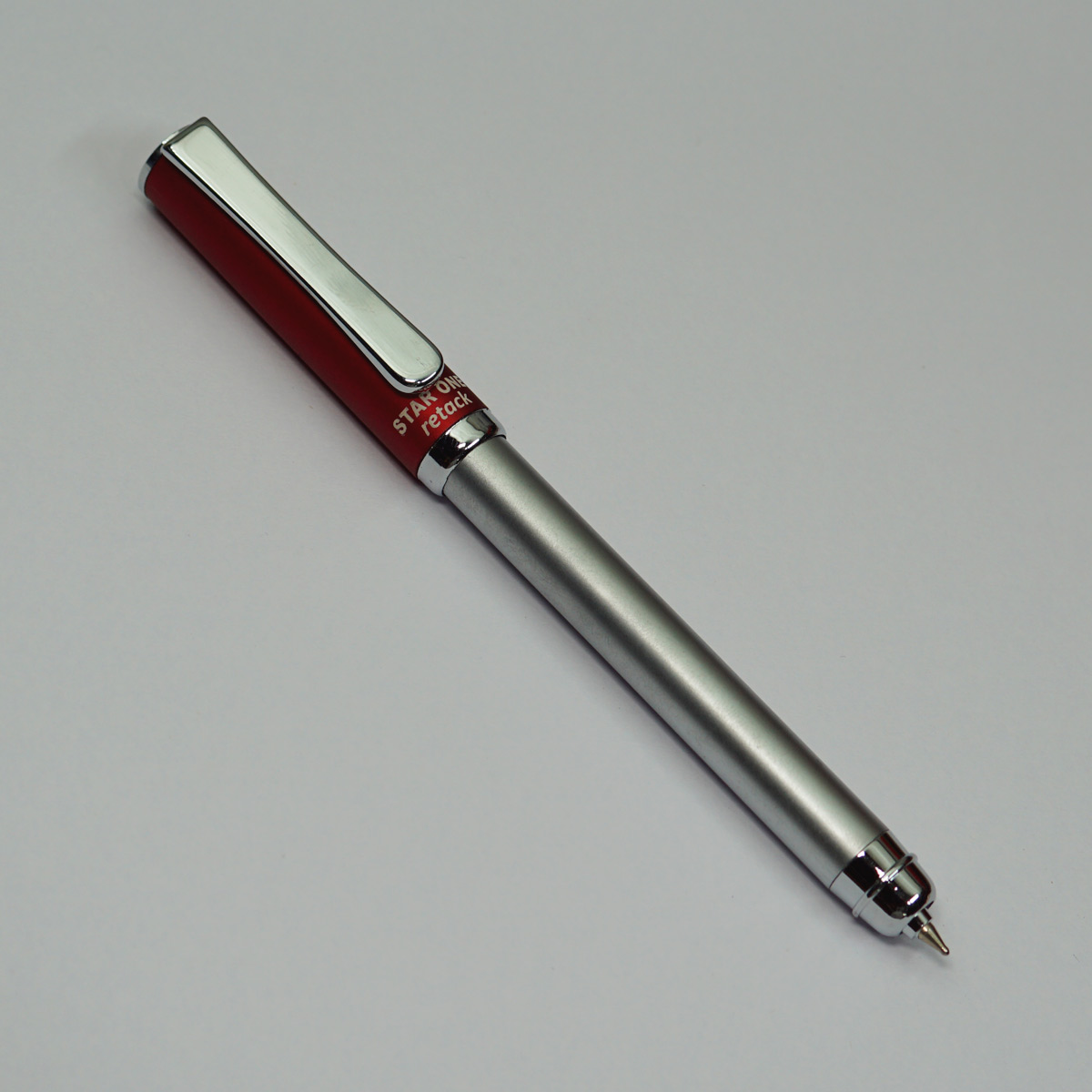 Star One Silver Color Body With Red Cap Fine Tip Pull And Push Type Ball Pen SKU 22947