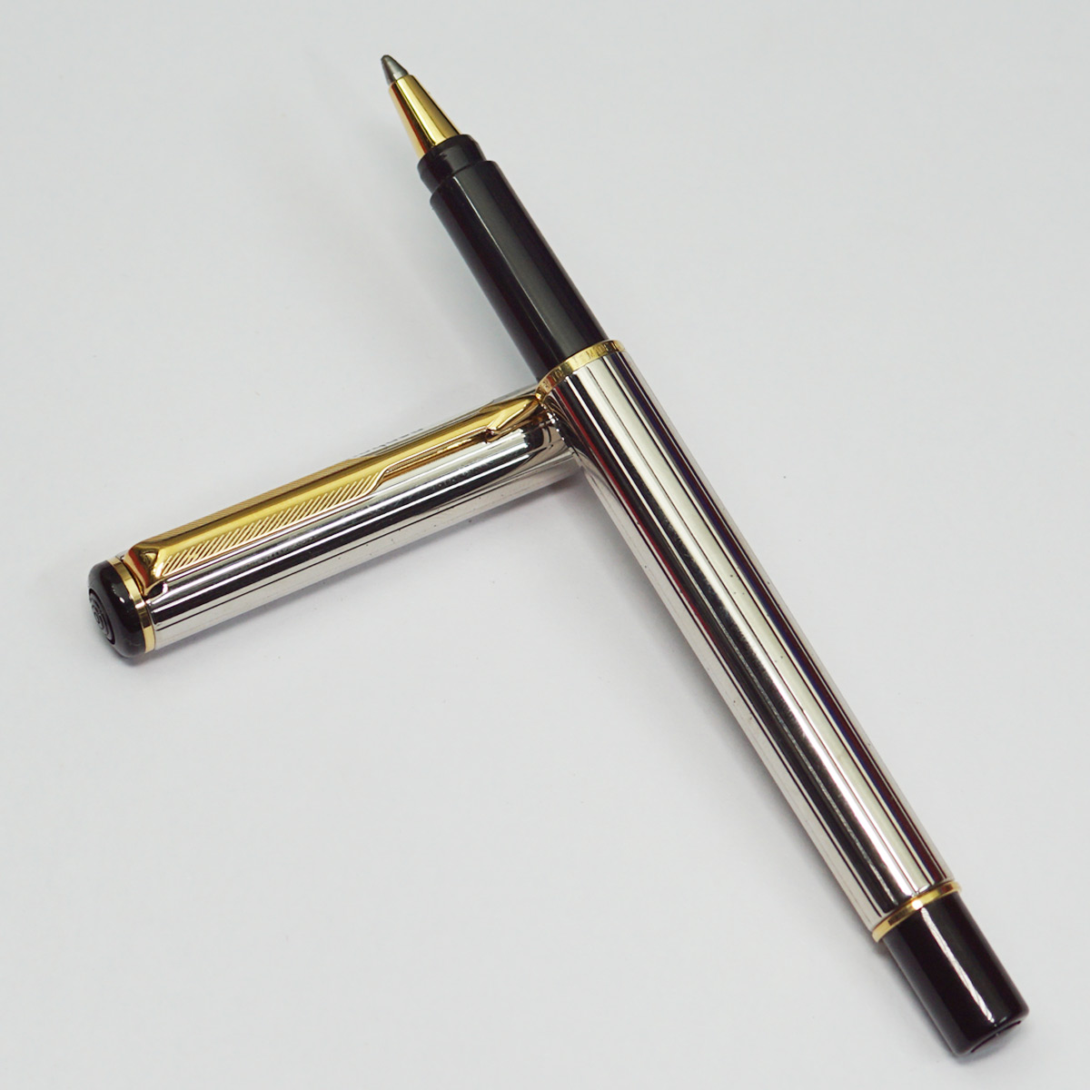 Parker Rialto Silver Color Body with Gold Clip Medium Tip Cap Type Ball Pen SKU 23017