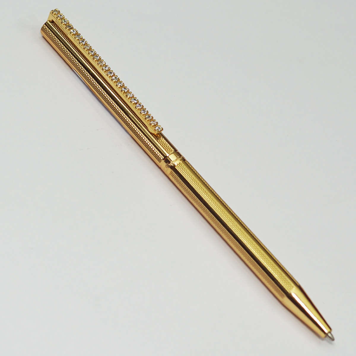 ST DuPont Golden Color Strip Line Body With Clip On Stone Medium Tip Twist Type Ball Pen SKU 23041