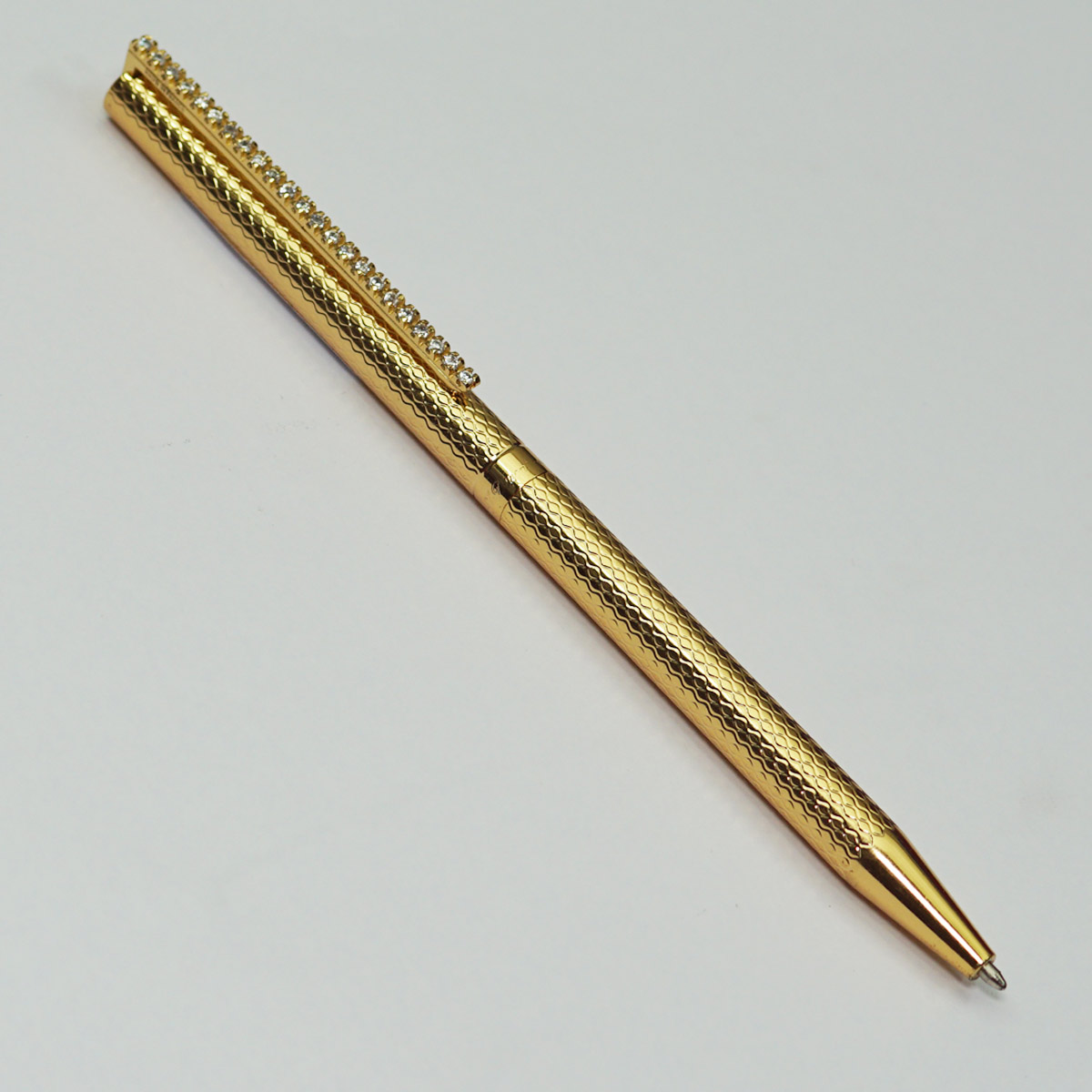 ST DuPont Golden Color Checked Body With Clip On Stone Medium Tip Twist Type Ball Pen SKU 23042