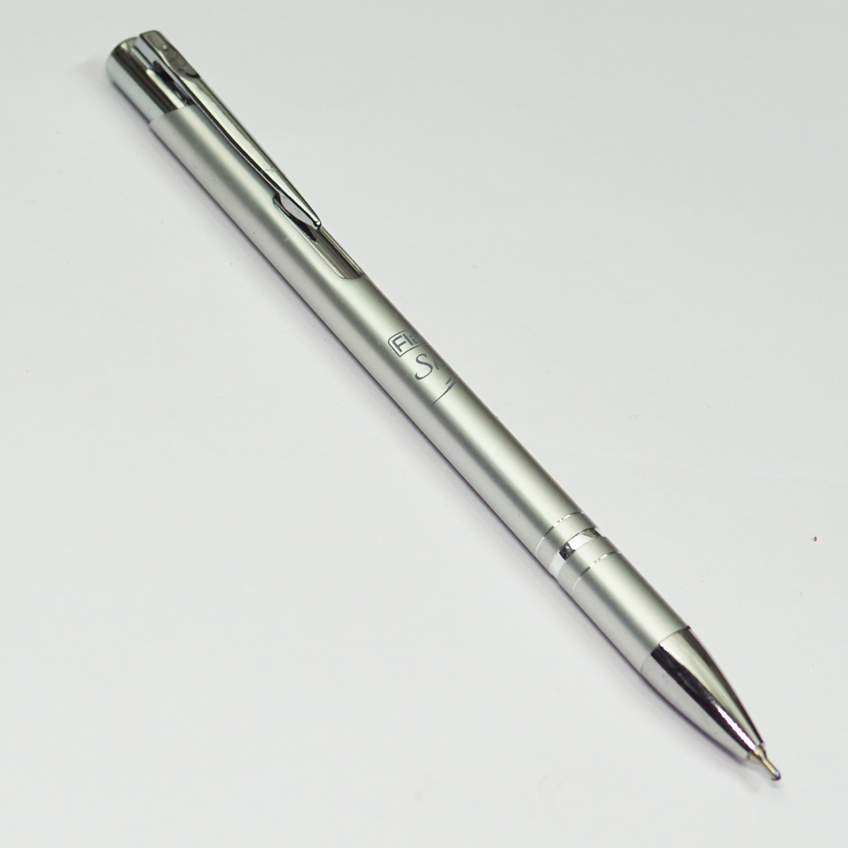 Flair  SKIN Silver Color Body With Silver Clip Fine Tip Retractable Type Ball Pen SKU 23053