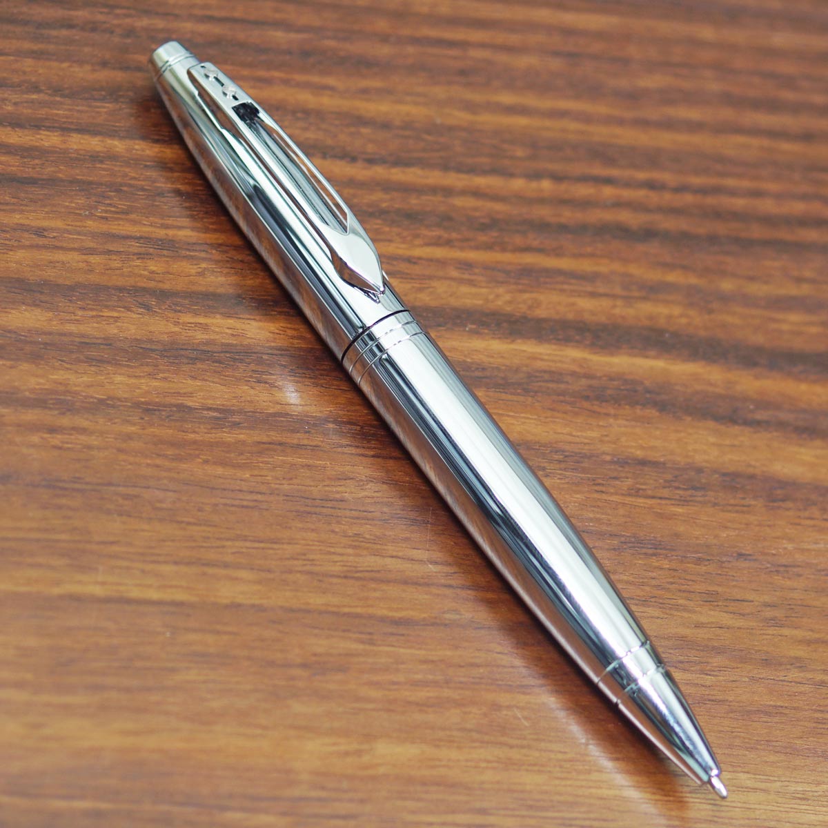 Cross Calais AT112 Chrome Silver Color Body And Cap With Medium Tip Silver Trims Twist Type Ball Pen SKU 23393