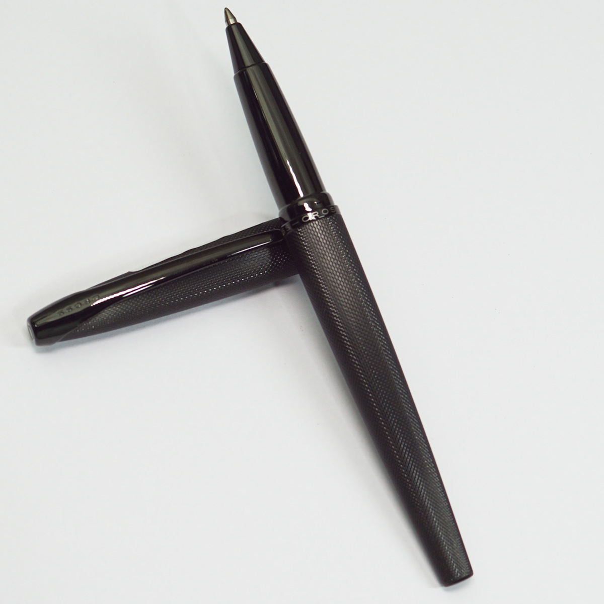 Cross ATX Brushed Black Color Body Design With Medium Tip Black Trims Cap Type Roller Ball Pen SKU 23398