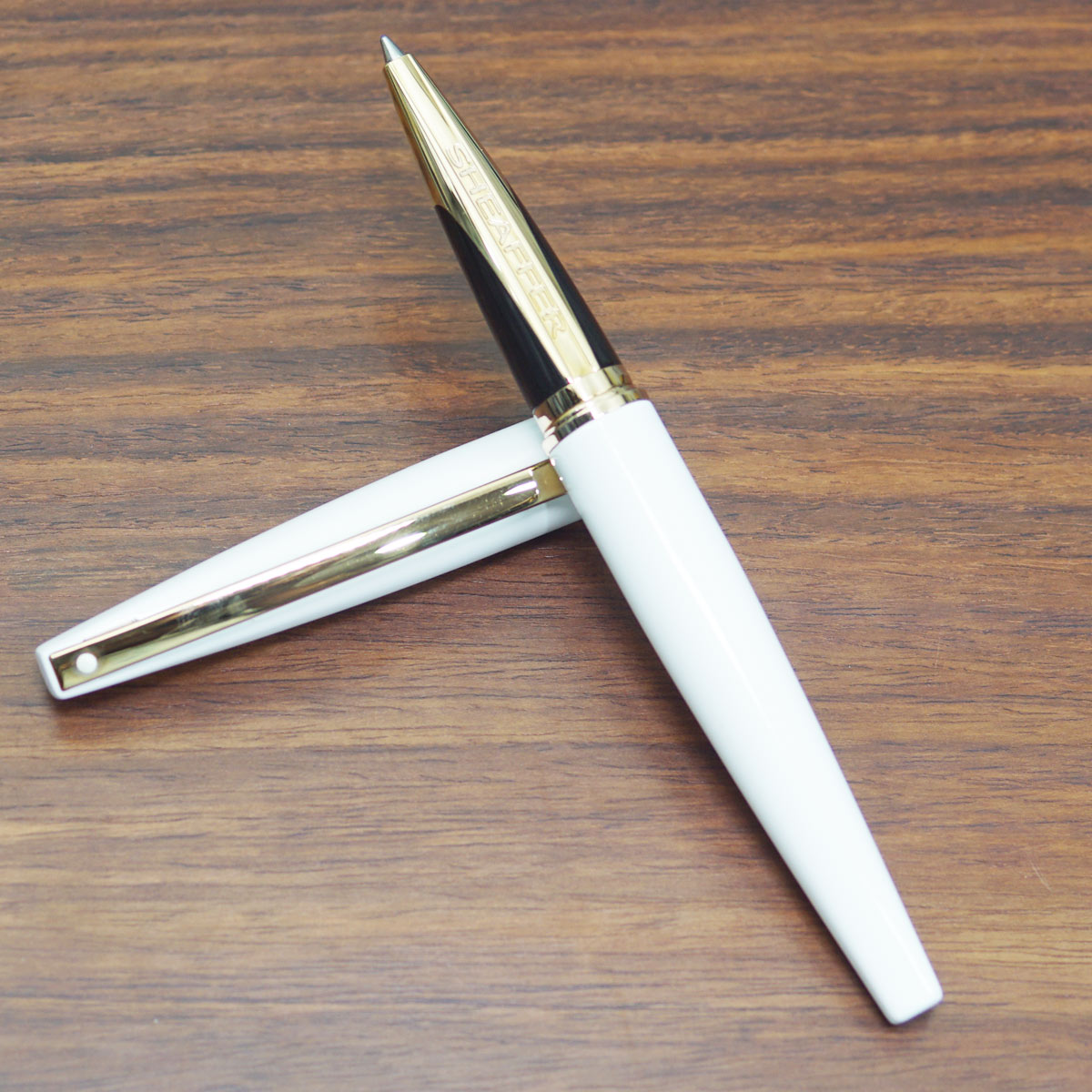 Sheaffer Taranis Glossy White Color Body With Medium Tip Gold Trim Roller Ball Pen SKU 23414