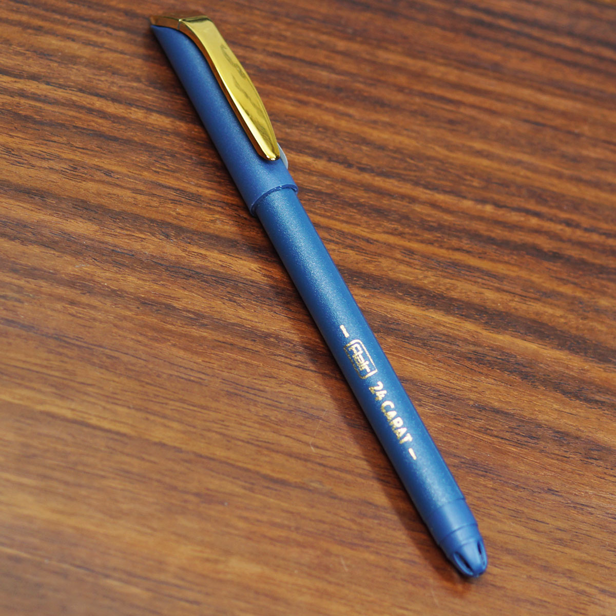Flair 24 Carat Blue Color Body With Golden Color Clip Fine Tip Blue Writing Cap Type Ball Pen SKU 23445