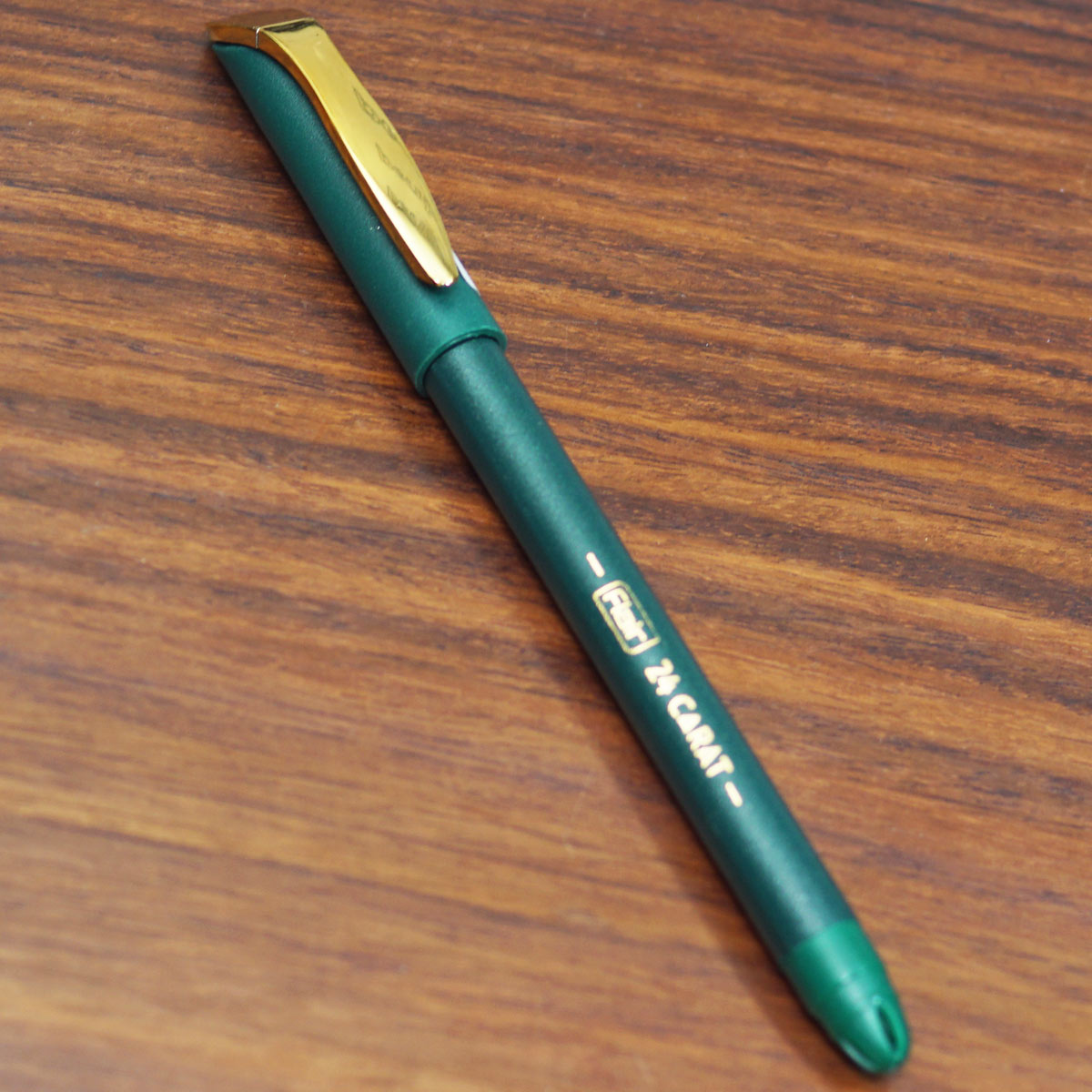 Flair 24 Carat Green Color Body With Golden Color Clip Fine Tip Blue Writing Cap Type Ball Pen SKU 23446