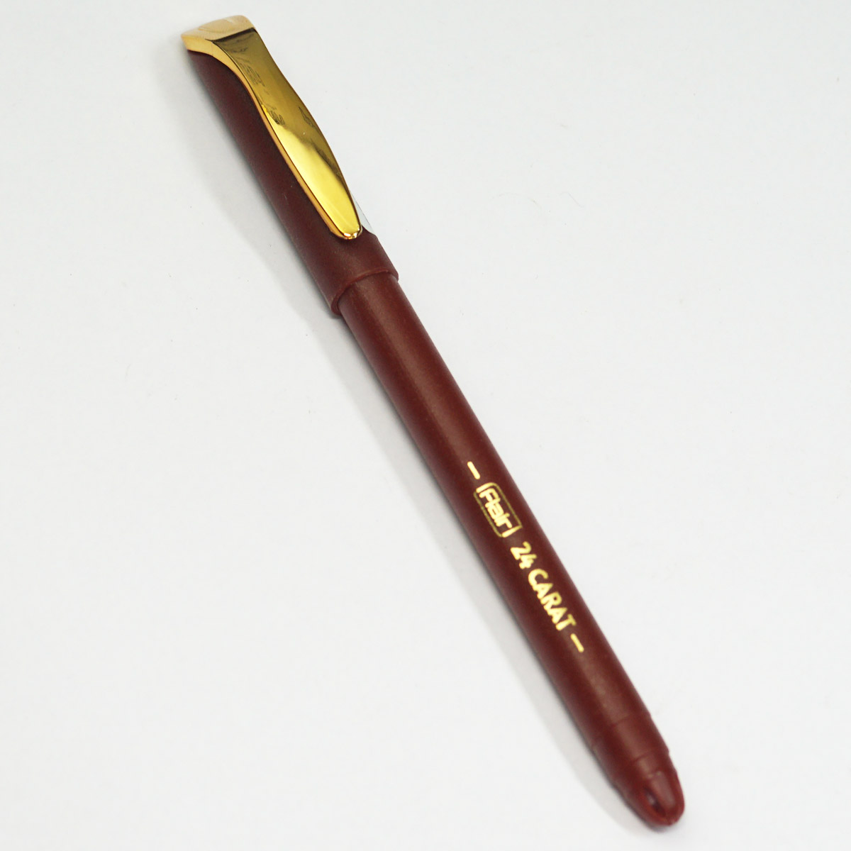 Flair 24 Carat Brown Color Body With Golden Color Clip Fine Tip Blue Writing Cap Type Ball Pen SKU 23448